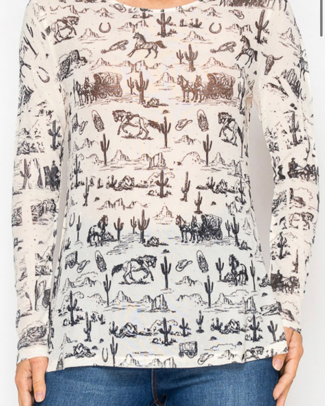 Person wearing a long-sleeve shirt with a desert-themed pattern on a white background