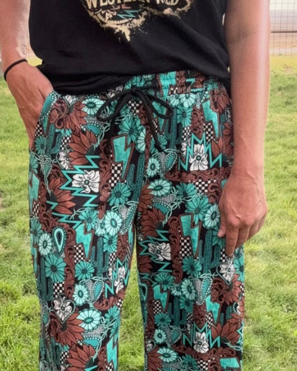 SK Tattoos in Turquoise Pants