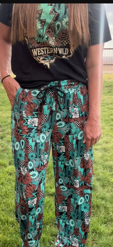 SK Tattoos in Turquoise Pants