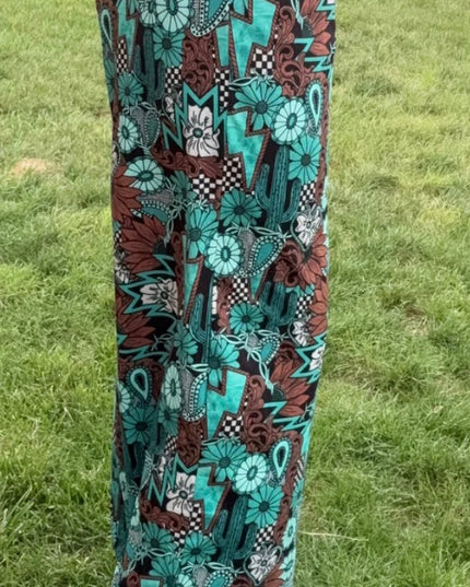 SK Tattoos in Turquoise Pants